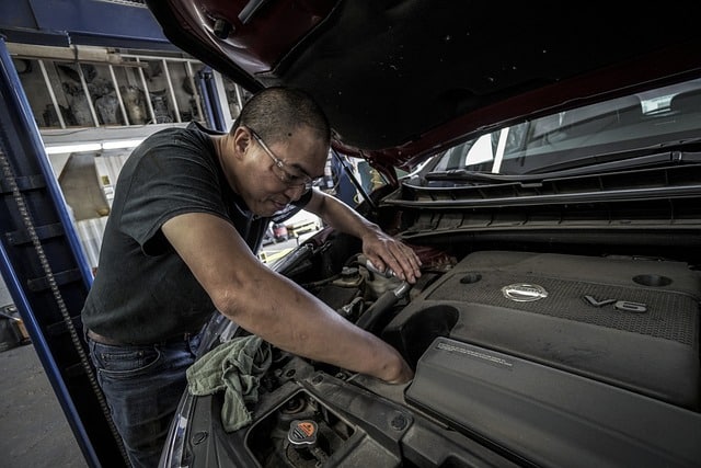 Man repairing a car