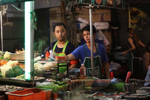 Two men selling by the road side