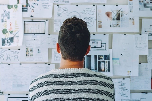 man thinking of local business ideas