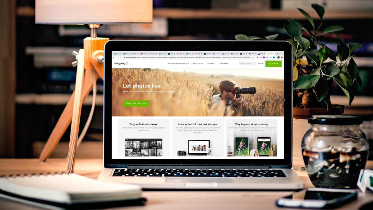 Photography website shown on a laptop.