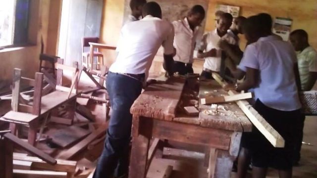 School student learning wood work