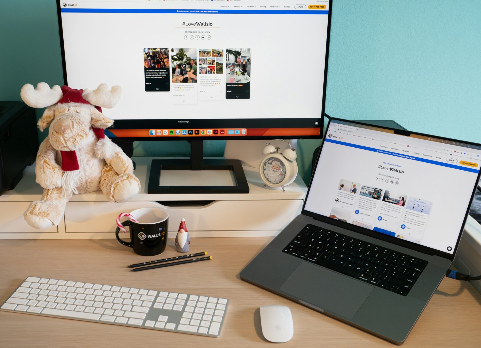 A desktop and a laptop computer on a table with an ebook design on the screen.